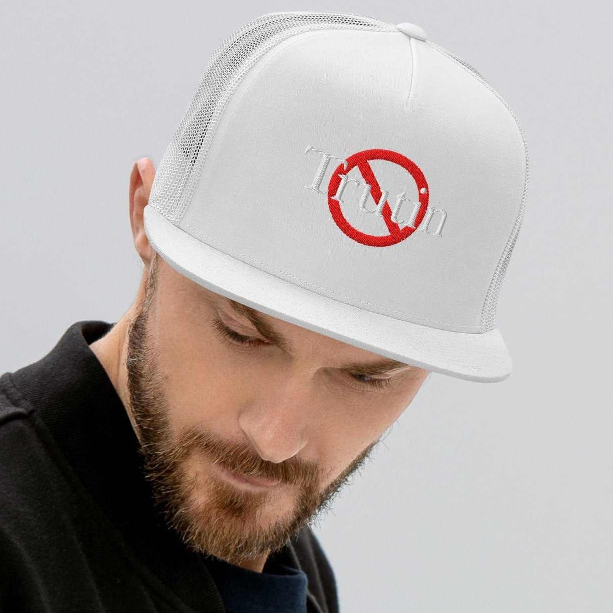“Model wearing a Trutin logo cap (multiple colors available) from Detour.Store”