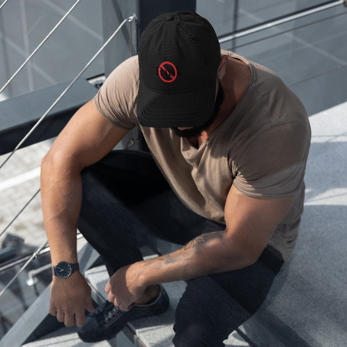 “Model wearing a Trusk logo cap (multiple colors available) from Detour.Store”