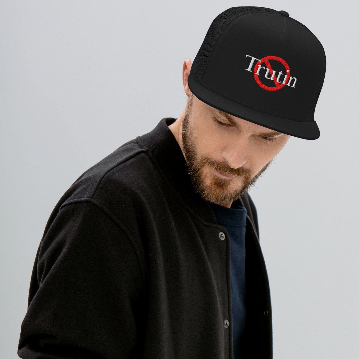 “Model wearing a Trutin logo cap (multiple colors available) from Detour.Store”