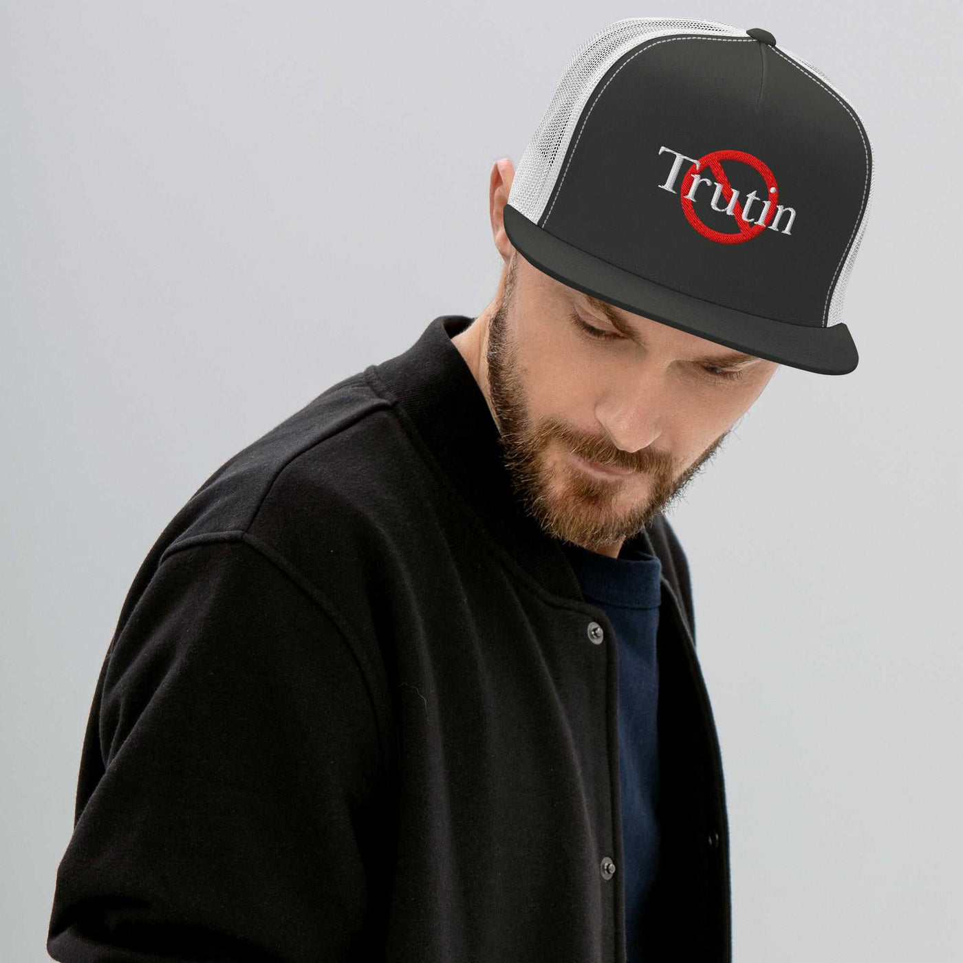 “Model wearing a Trutin logo cap (multiple colors available) from Detour.Store”