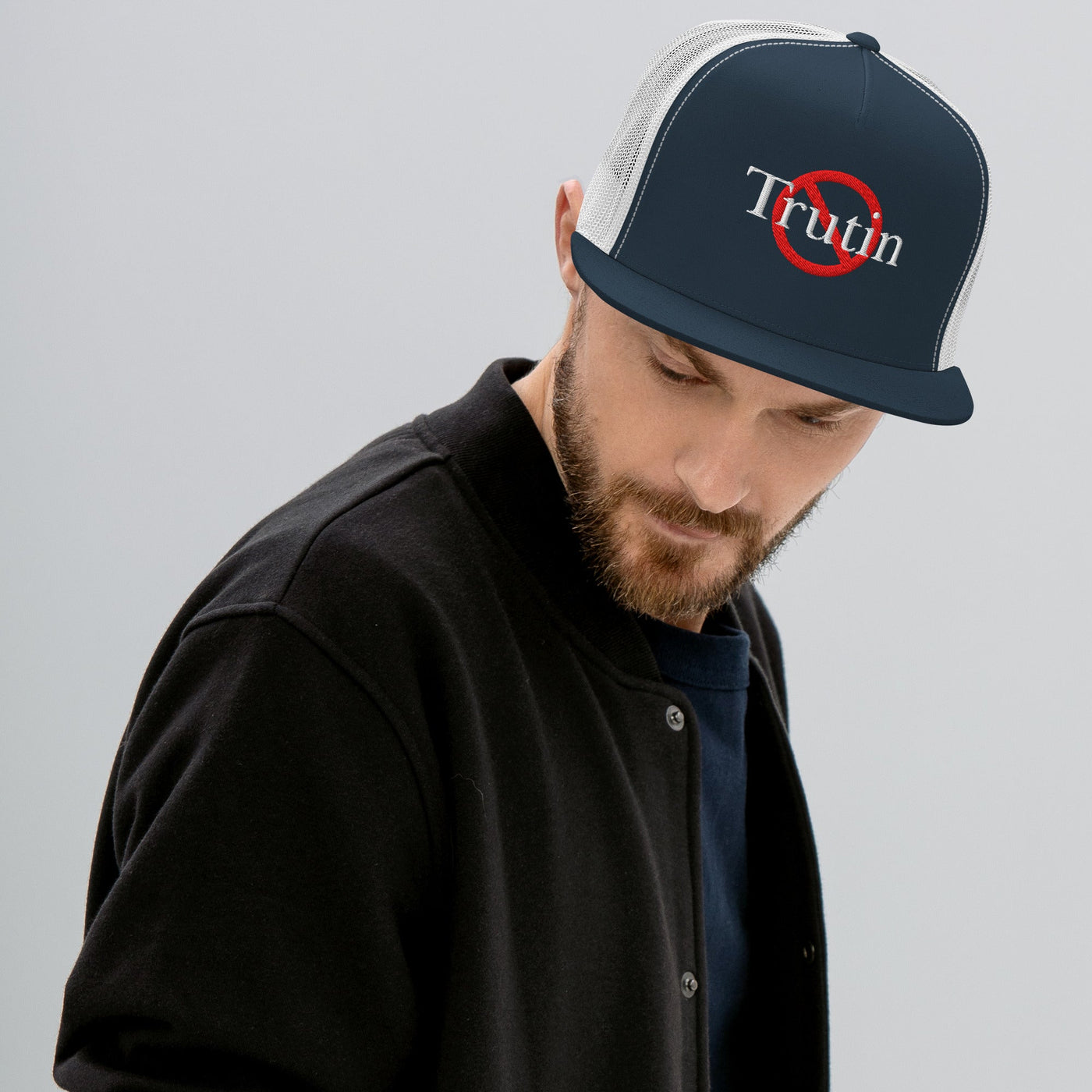 “Model wearing a Trutin logo cap (multiple colors available) from Detour.Store”e 