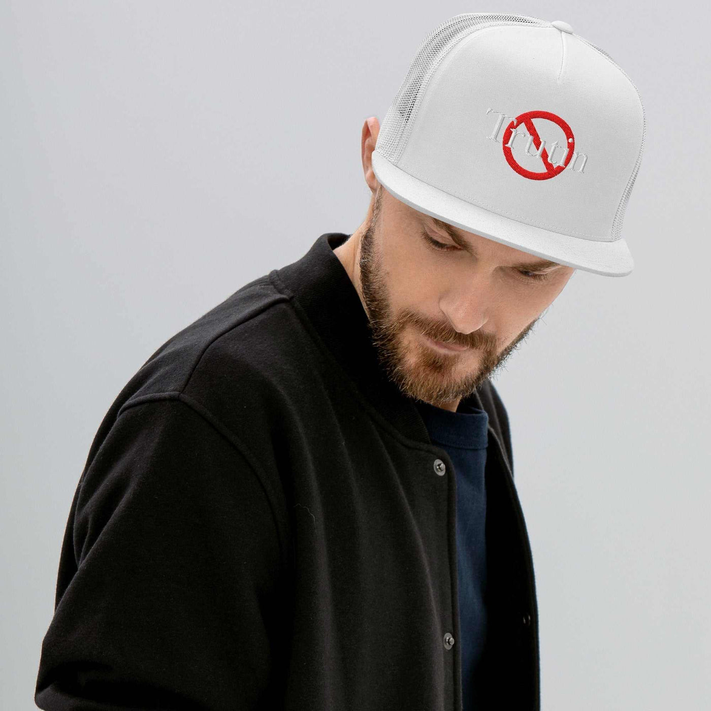 “Model wearing a Trutin logo cap (multiple colors available) from Detour.Store”