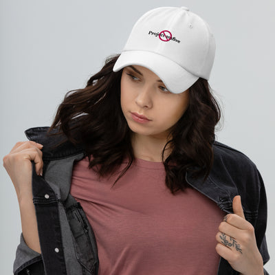 “Model wearing a No Project 2025 cap (multiple colors available) from Detour.Store”