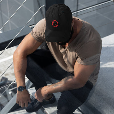 “Model wearing a Trusk logo cap (multiple colors available) from Detour.Store”