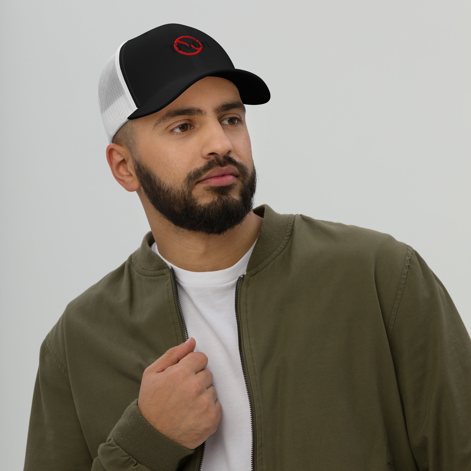 “Model wearing a Trutin logo cap (multiple colors available) from Detour.Store”