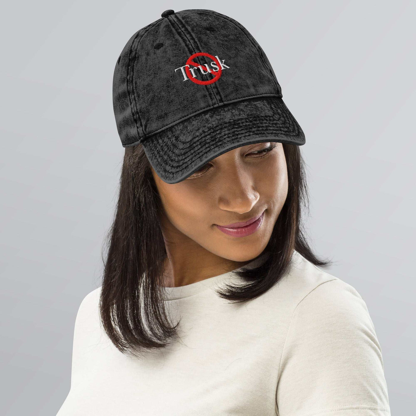 “Model wearing a Trusk logo cap (multiple colors available) from Detour.Store”