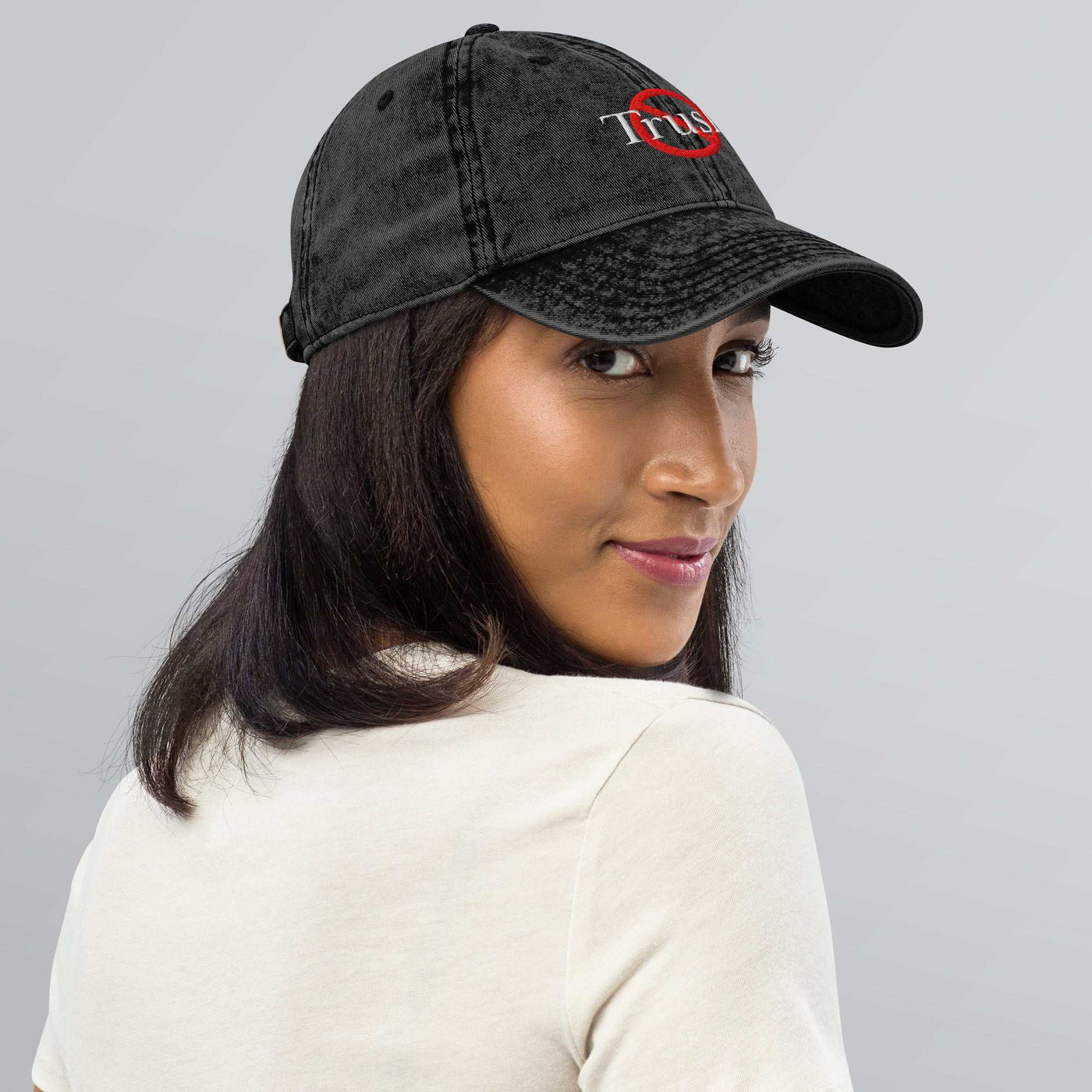 “Model wearing a Trusk logo cap (multiple colors available) from Detour.Store”